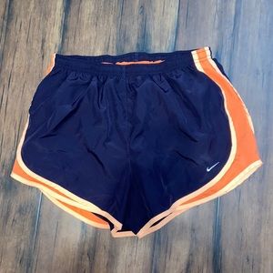 dark purple and orange nike running shorts